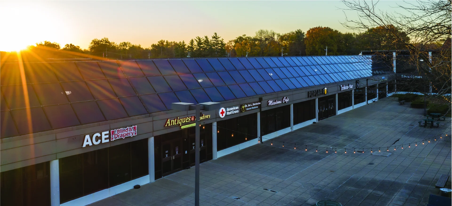 Exterior of The Meadows Shopping Center at sunset