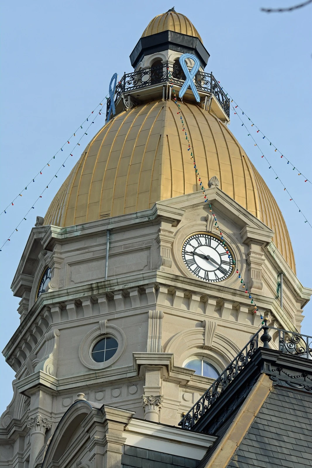 Gold dome and clock tower of Vigo County Courthouse in Terre Haute